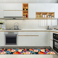 Passatoia Cucina Daily Joy in a modern kitchen with colorful floral design on the floor.