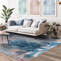 Tappeto Indoor Acacia in un salotto elegante con divano e piante decorative